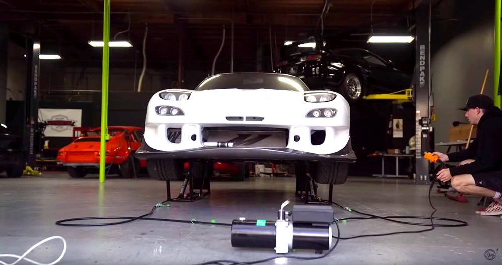 TJ Hunt with his QuickJack car lift on YouTube